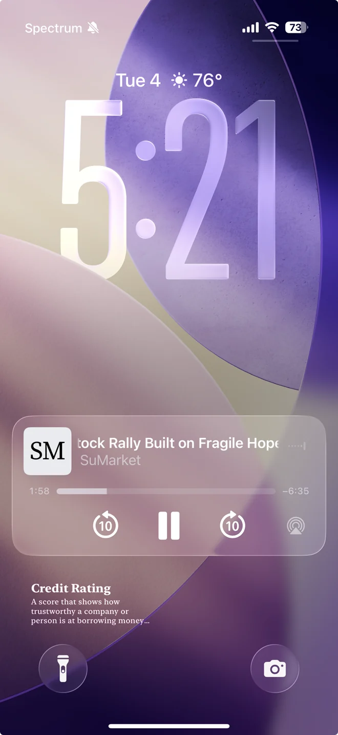 An iPhone lock screen playing a SuMarket brief, with the term of the day below it
